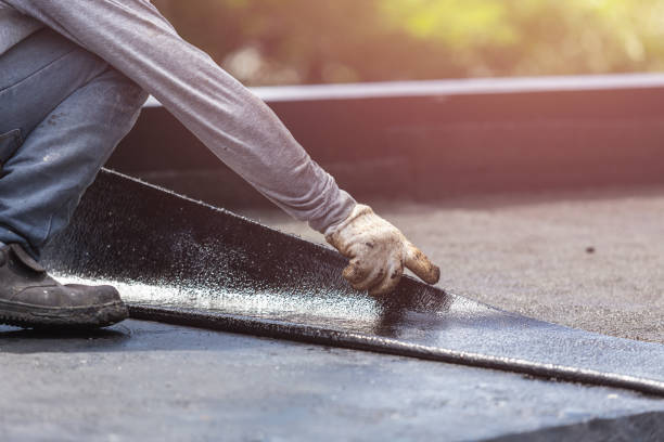 Professional Basement Waterproofing technician working in Oakland, NJ